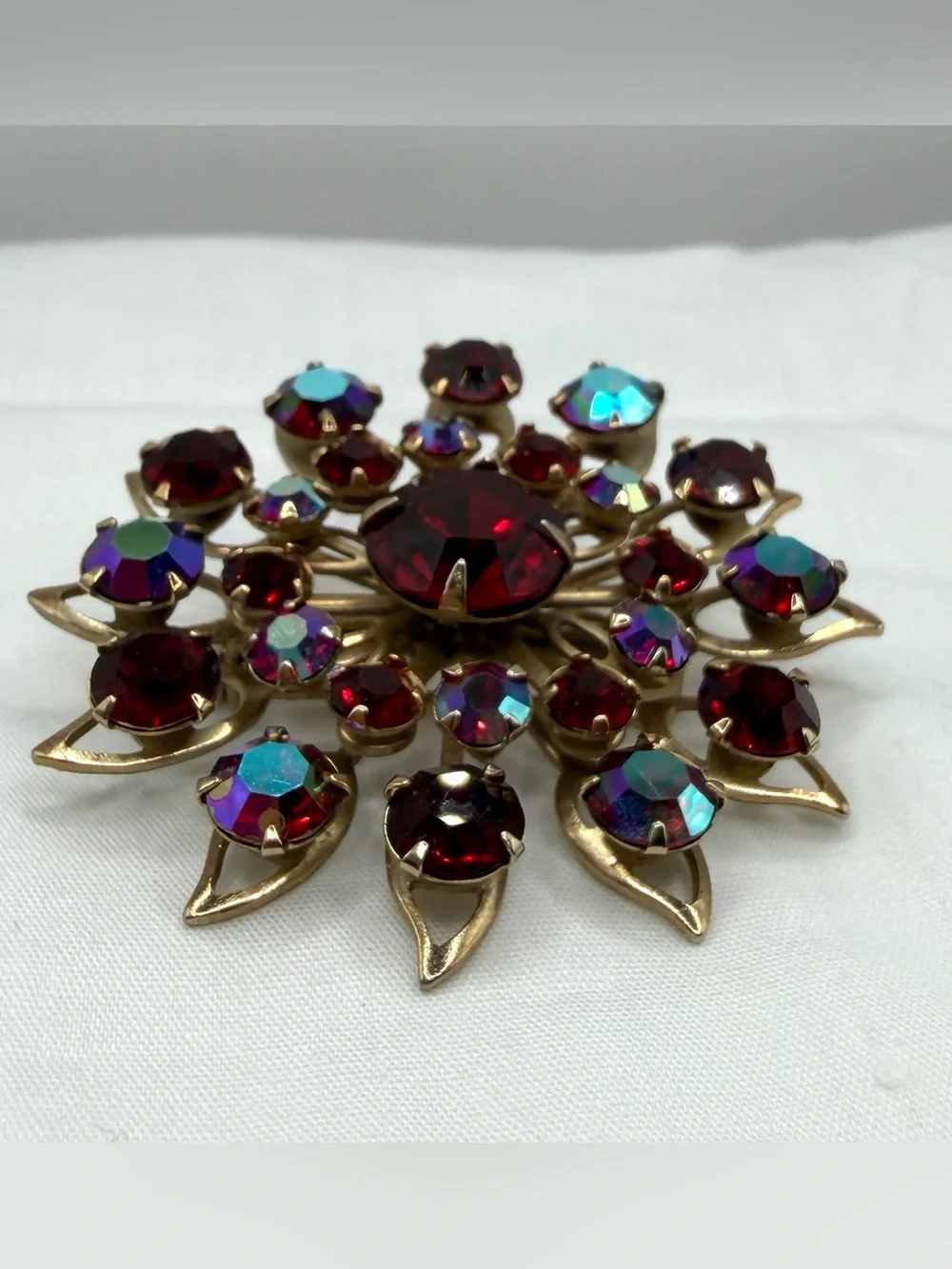 Vintage Starburst Brooch Pin Goldtone Faceted Deep Red Iridescent Rhinestones